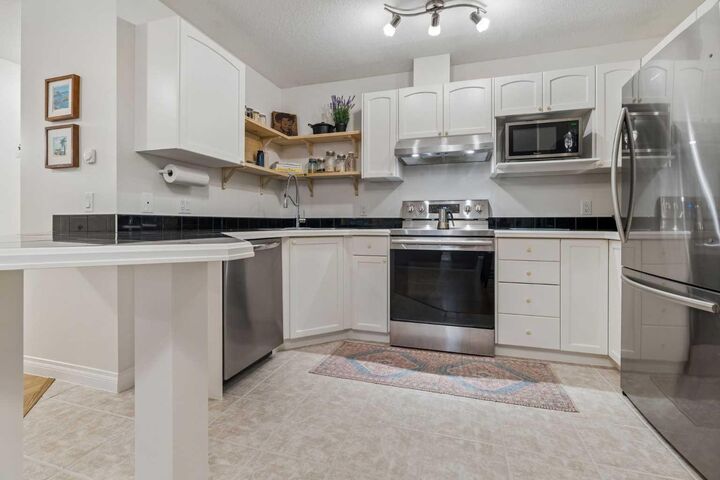 Property Photo:  1631 28 Avenue SW 310  AB T2T 1J5 