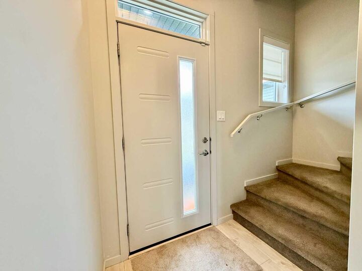 Property Photo:  482 Highlands Boulevard W 2  AB T1J 5K5 