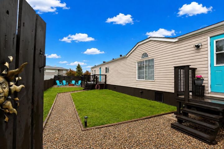 Property Photo:  23 Meadowlake Gate E  AB T1R 1E9 
