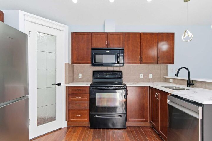 Property Photo:  203 Auburn Bay Heights SE  AB T3M 0A8 