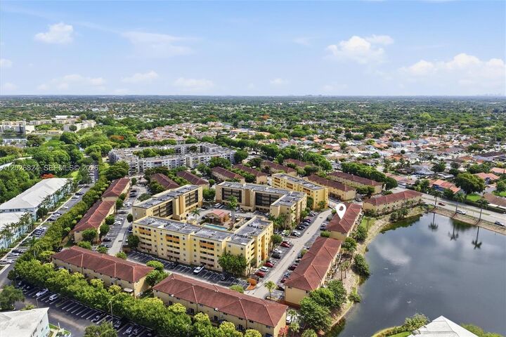Property Photo:  8240 SW 149th Ct 7-201  FL 33193 