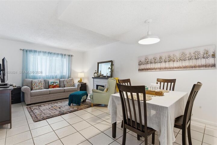 Property Photo:  8240 SW 149th Ct 7-201  FL 33193 