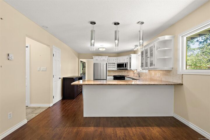 Property Photo:  1094 Sluggett Rd  BC V8M 1J1 