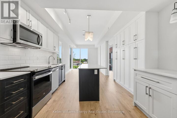 Property Photo:  201 Brock Street South 417  ON L1N 0P8 