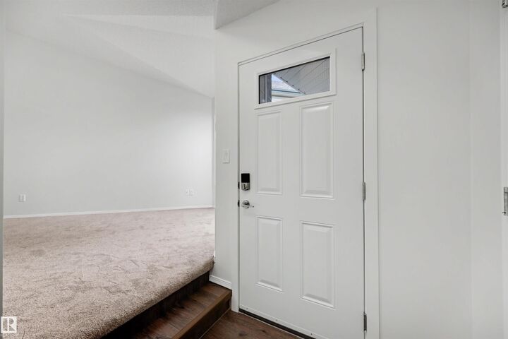 Property Photo:  11815 8 Avenue NW  AB T6J 6Z9 
