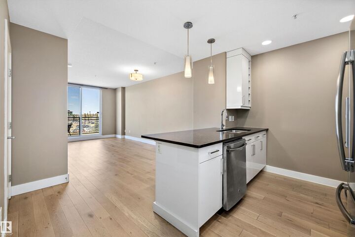Property Photo: 11080 Ellerslie Rd SW 307 AB T6W 2C2