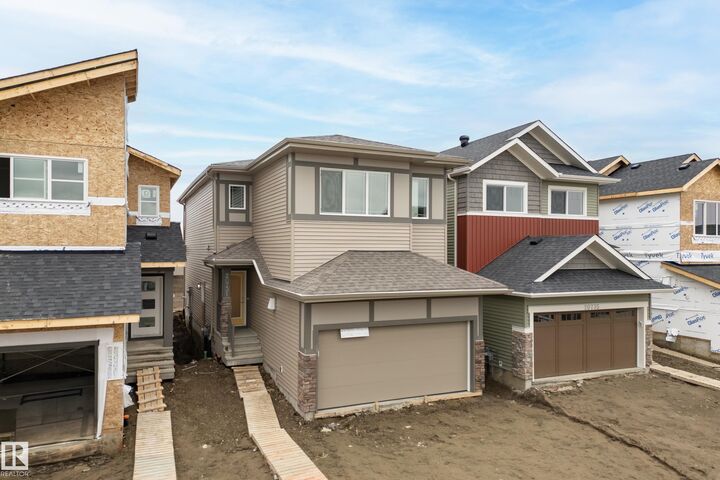 Property Photo:  20731 24 Avenue NW  AB T6M 2C4 