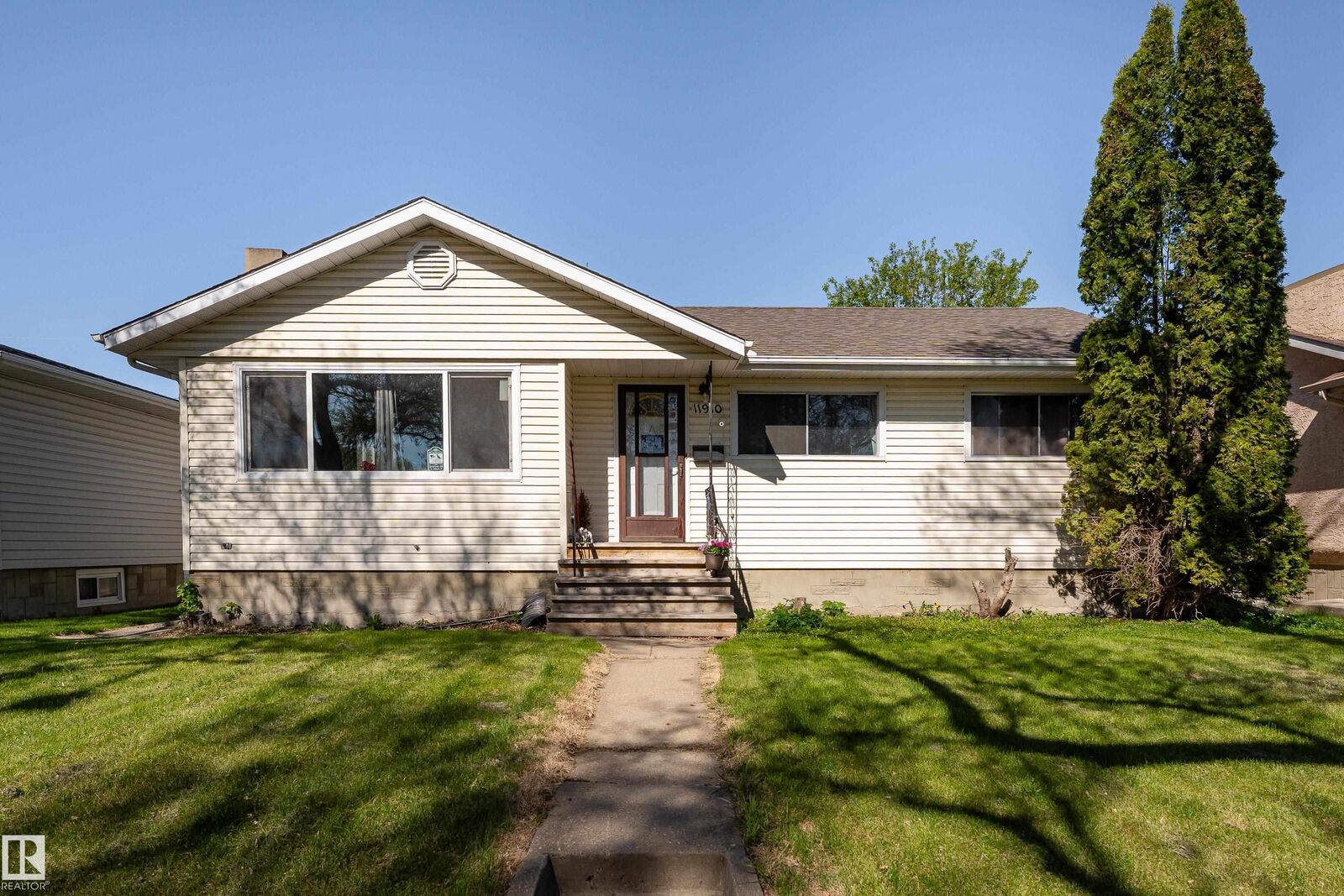 Property Photo:  11910 43 Street NW  AB T5W 2P6 