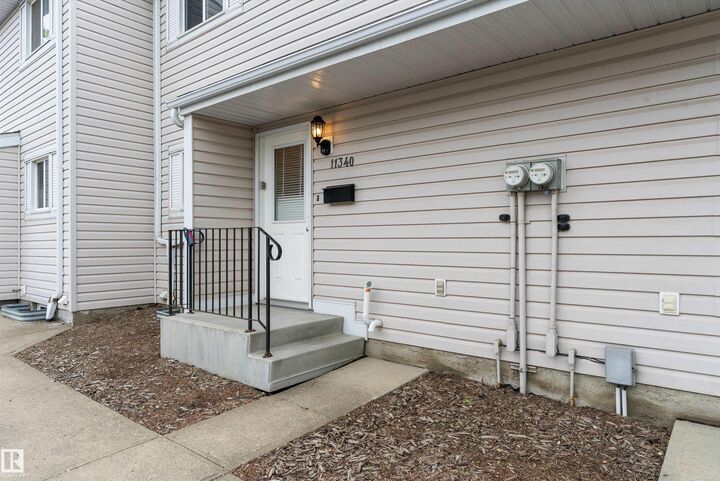 Property Photo:  11340 139 Avenue NW  AB T5X 3L4 