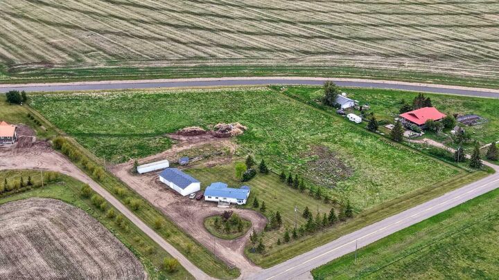 Property Photo:  242041 Township Road 262  AB T1P 0L6 