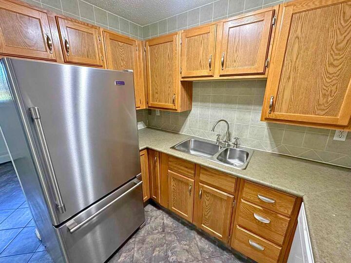 Property Photo: 7031 Gray Drive 102 AB T4P 2B1