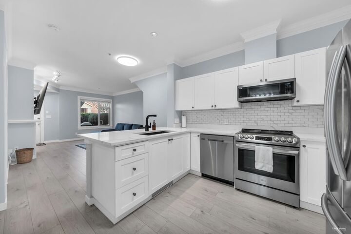 Property Photo: 18 Jack Mahony Place 122 BC V3L 5V8