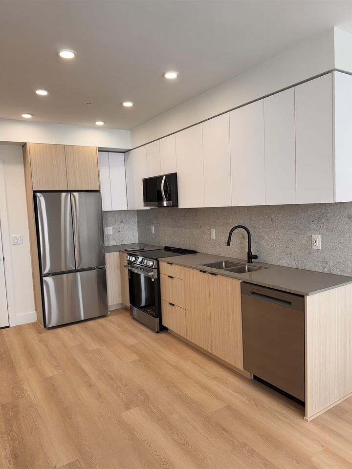 Property Photo:  13455 94A Avenue 303  BC V3V 0H3 