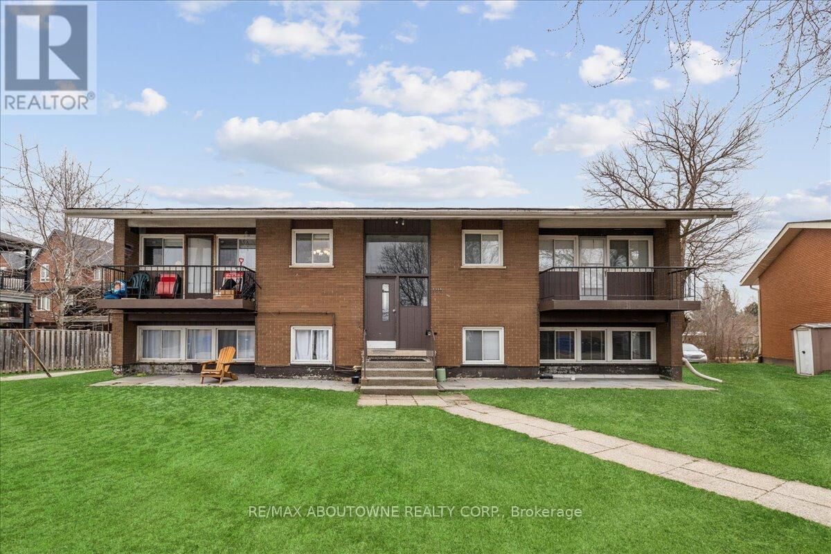 Property Photo: 2350 Queensway Drive 3 ON L7R 3T3