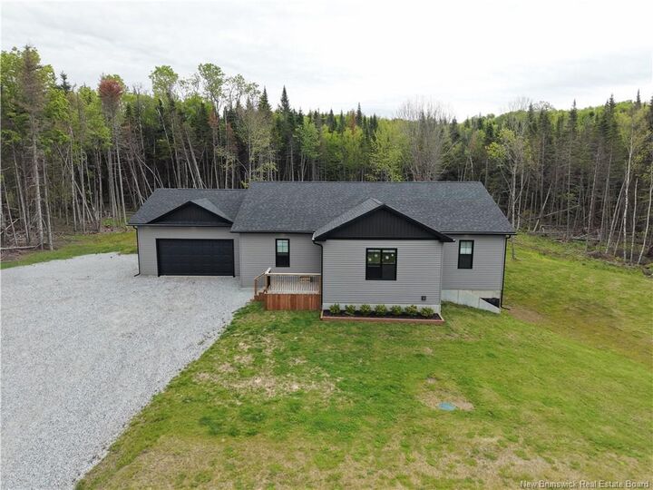 Property Photo: 130 Lake Road South NB E5N 0M7
