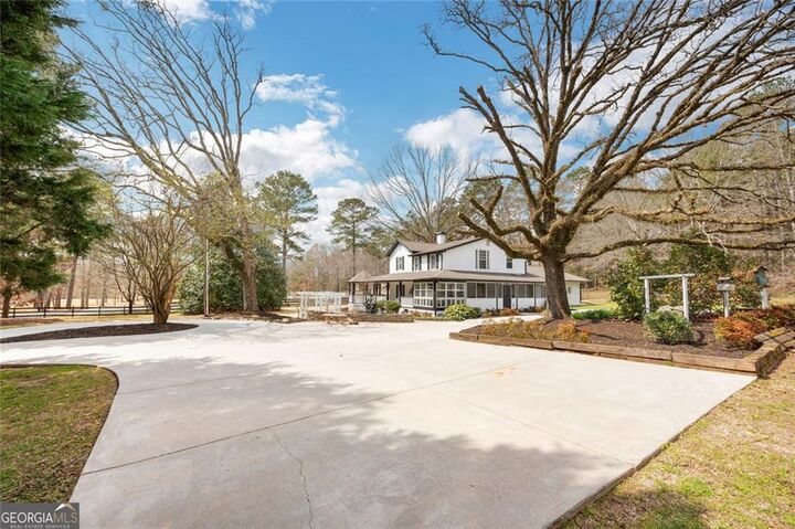 Property Photo:  813 Sandy Creek Road  GA 30214 