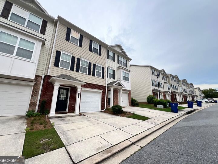 Property Photo: 6877 Slate Stone Way SE GA 30126