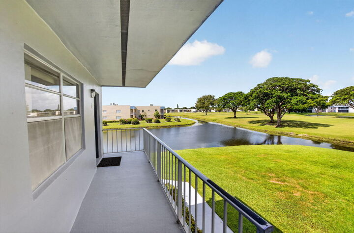 Property Photo:  265 Burgundy F  FL 33484 