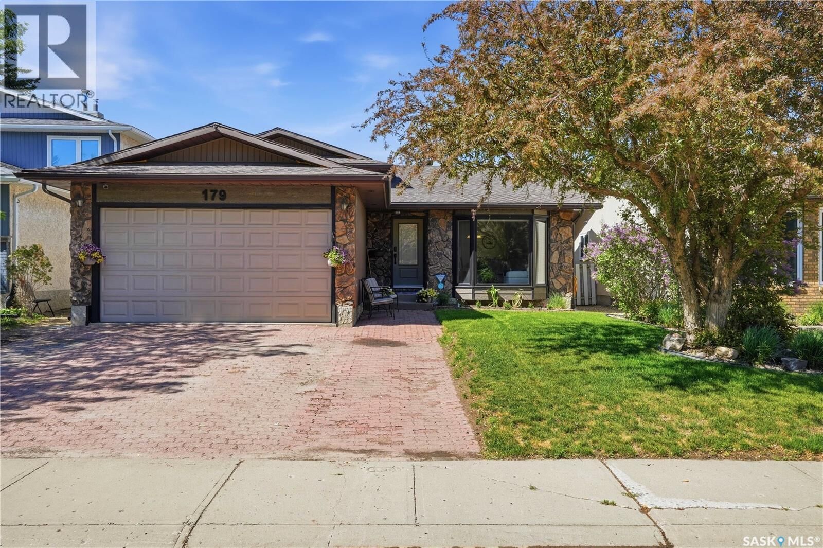 Property Photo: 179 Merlin Crescent SK S4R 3E6