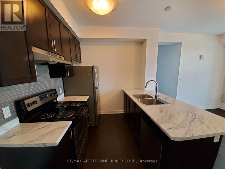 Property Photo:  2490 Old Bronte Road 205  ON L6M 0Y5 