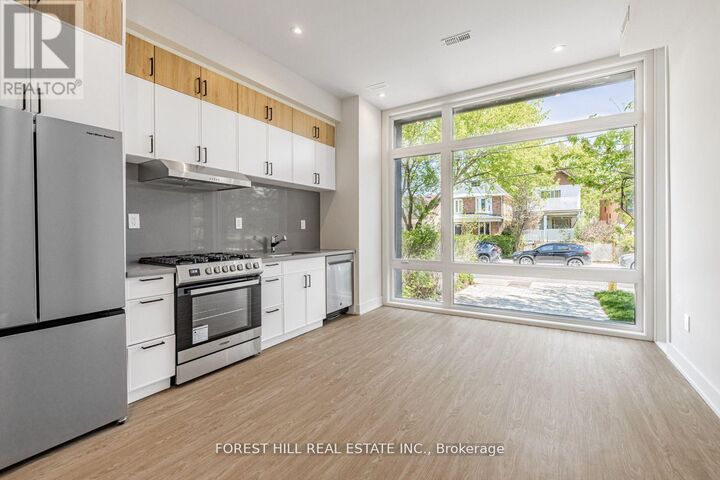 Property Photo: 124 Kenwood Avenue Main #1 ON M6C 2S3