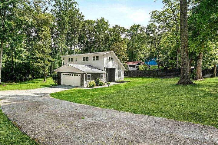 Property Photo:  6985 Butner Road  GA 30349 