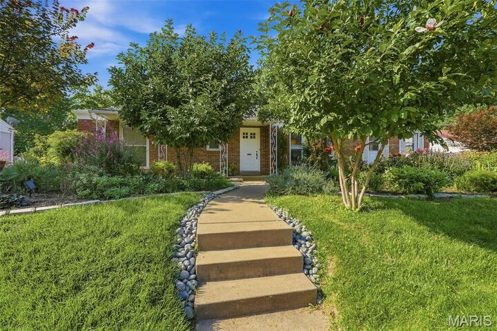 Property Photo:  8412 Old Bonhomme Road  MO 63132 
