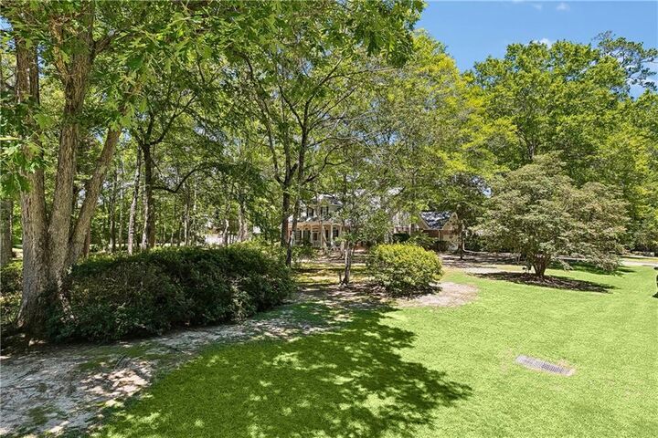 Property Photo: 213 Hawthorne Hollow Drive LA 70447