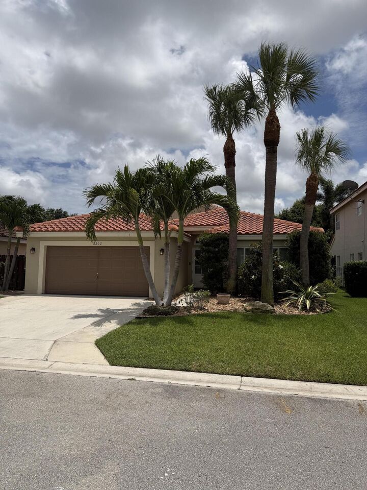 Property Photo: 8202 White Rock Circle FL 33436