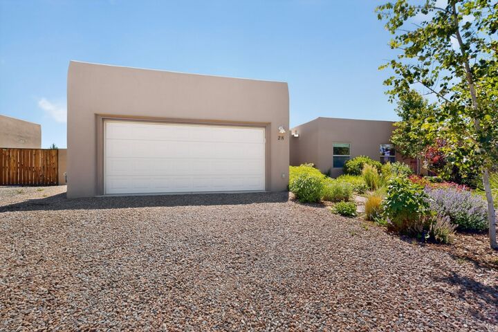 Property Photo: 28 Canto Del Pajaro NM 87508