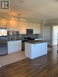 Property Photo:  9225 Jane Street 404  ON L6A 0J7 