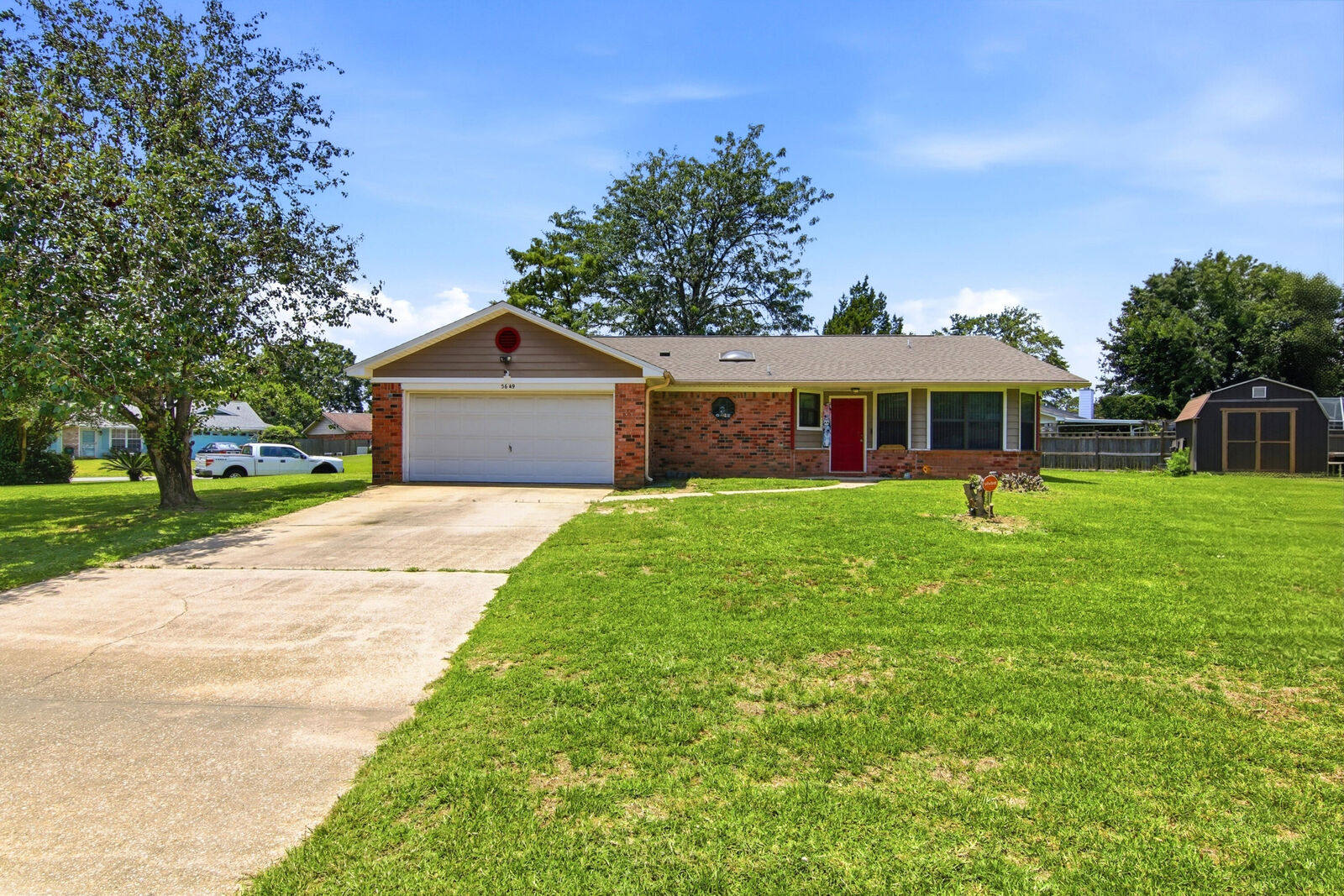 Property Photo:  5649 Dove Drive  FL 32571 