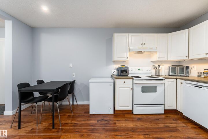 Property Photo: 10208 113 Street NW 26 AB T5G 0W9