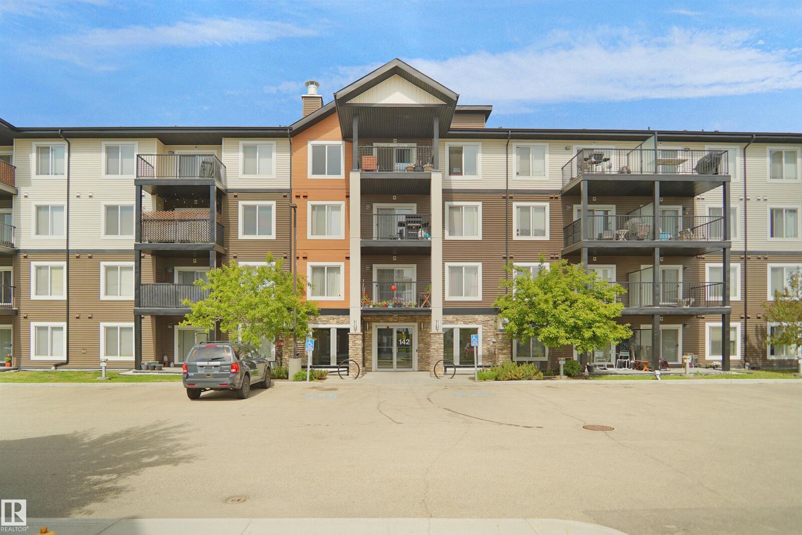 Property Photo: 142 Ebbers Boulevard NW 202 AB T5Y 3W2