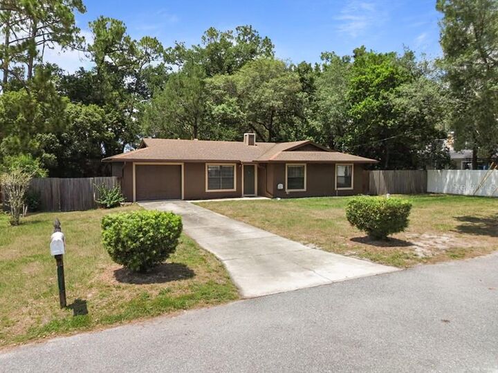 Property Photo: 214 E Floyd Avenue FL 32746