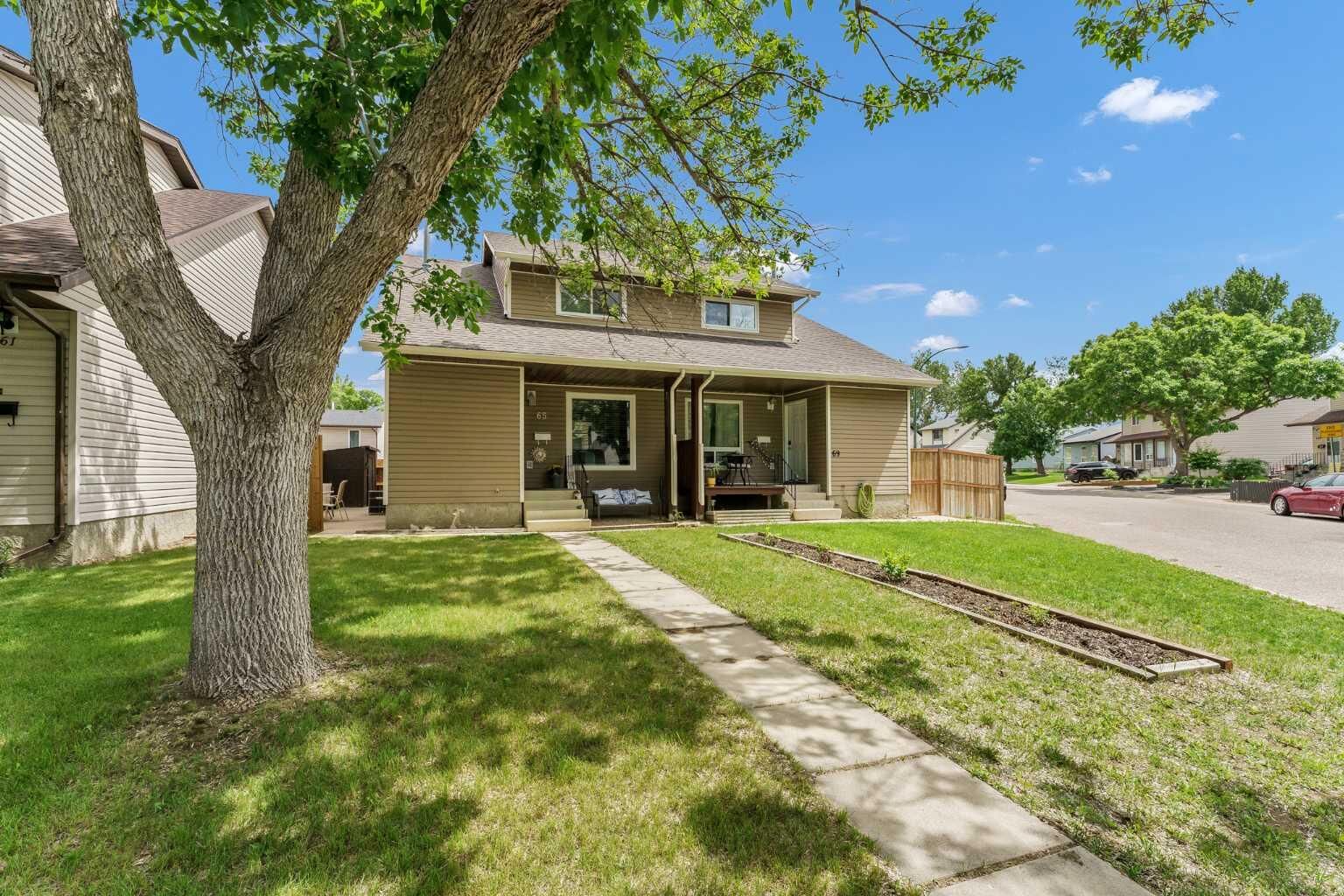 Property Photo: 65 South Ridge Crescent SW AB T1B 2P2