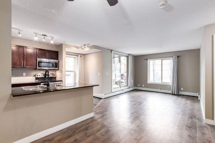 Property Photo: 403 Mackenzie Way SW 9116 AB T4B 3V7