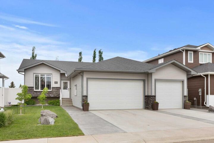 Property Photo:  104 Somerside Way SE  AB T1B 0M2 