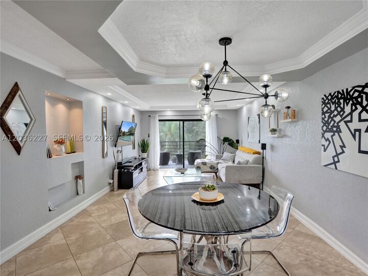 Property Photo:  9440 SW 8th St 309  FL 33428 