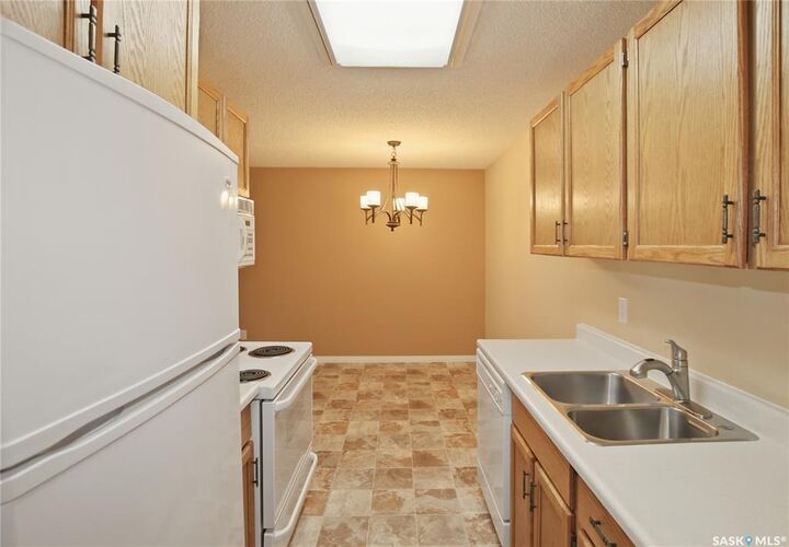 Property Photo: 1130 9th Avenue NE 205 SK S9H 2S9