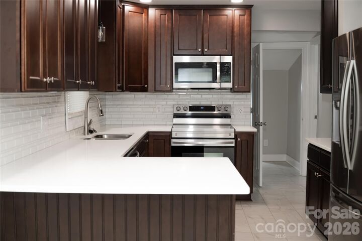 Property Photo:  1215 W Fourth Avenue  NC 28052 