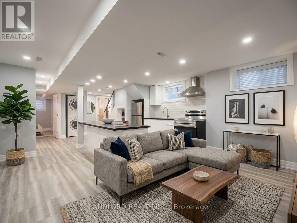 Property Photo: 1001 Cosburn Avenue Bsmt ON M4C 2W8