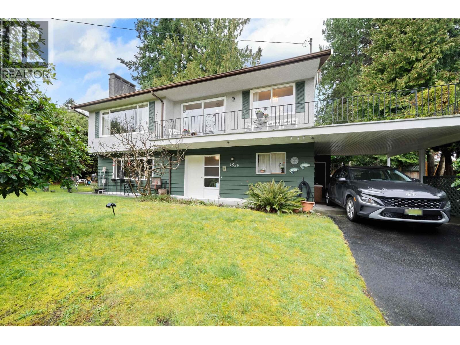 Property Photo:  1553 55A Street  BC V4M 3M8 