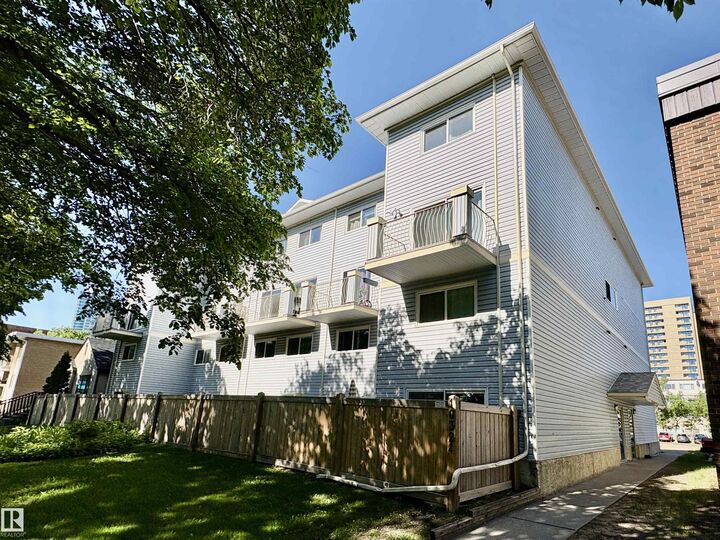 Property Photo:  10324 119 Street NW 3  AB T5K 1Z6 