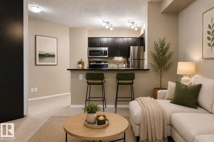 Property Photo:  3211 James Mowatt Trail SW 112  AB T6W 3L6 