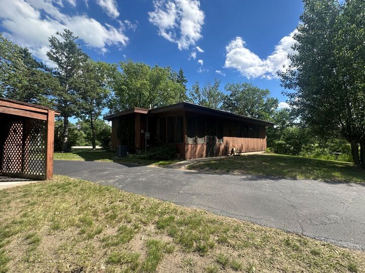 Property Photo:  1402 N McKay Avenue NE  MN 56308 