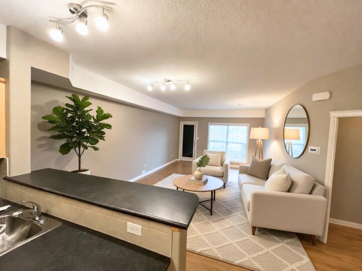 Property Photo: 201 River Ridge Drive NW 235 AB T1A 8V5