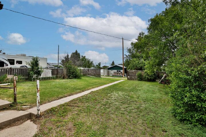 Property Photo:  221 1 Street S  AB T0L 1G0 