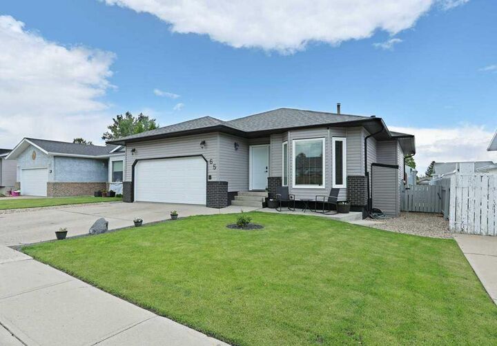 Property Photo: 65 Parkland Way E AB T1R 0M6