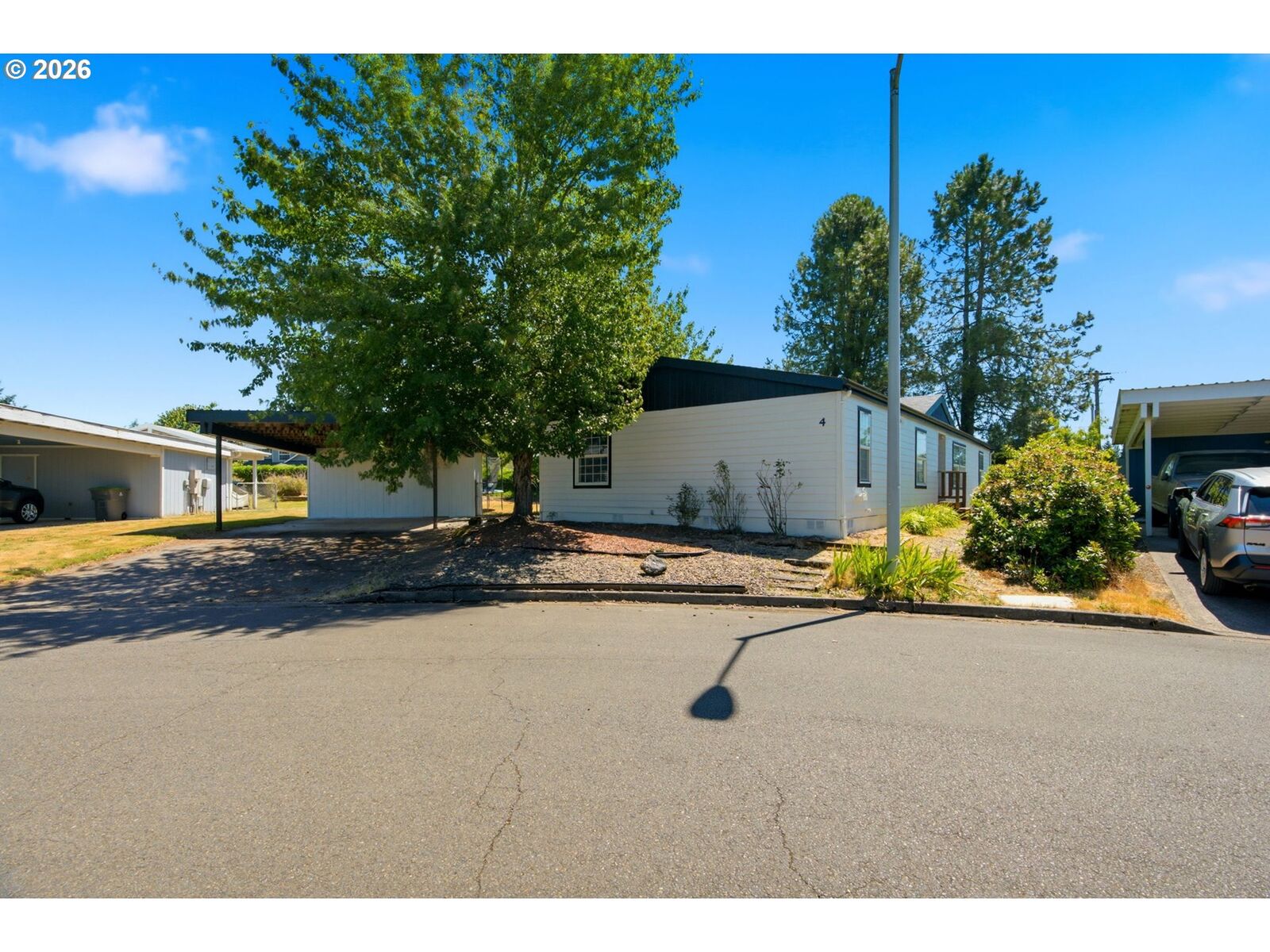 Property Photo:  655 NE Burnett Rd 4  OR 97128 